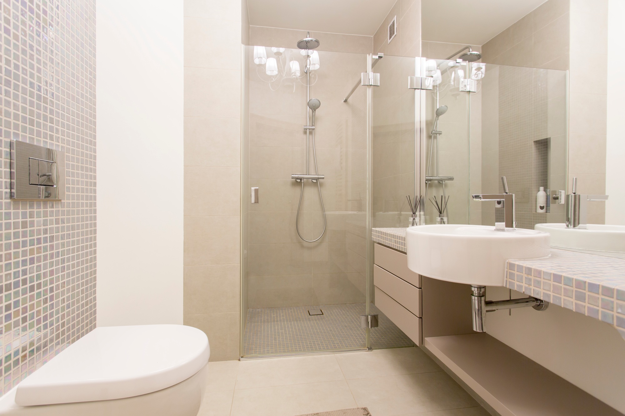 Modern, bright bathroom with glazed showe