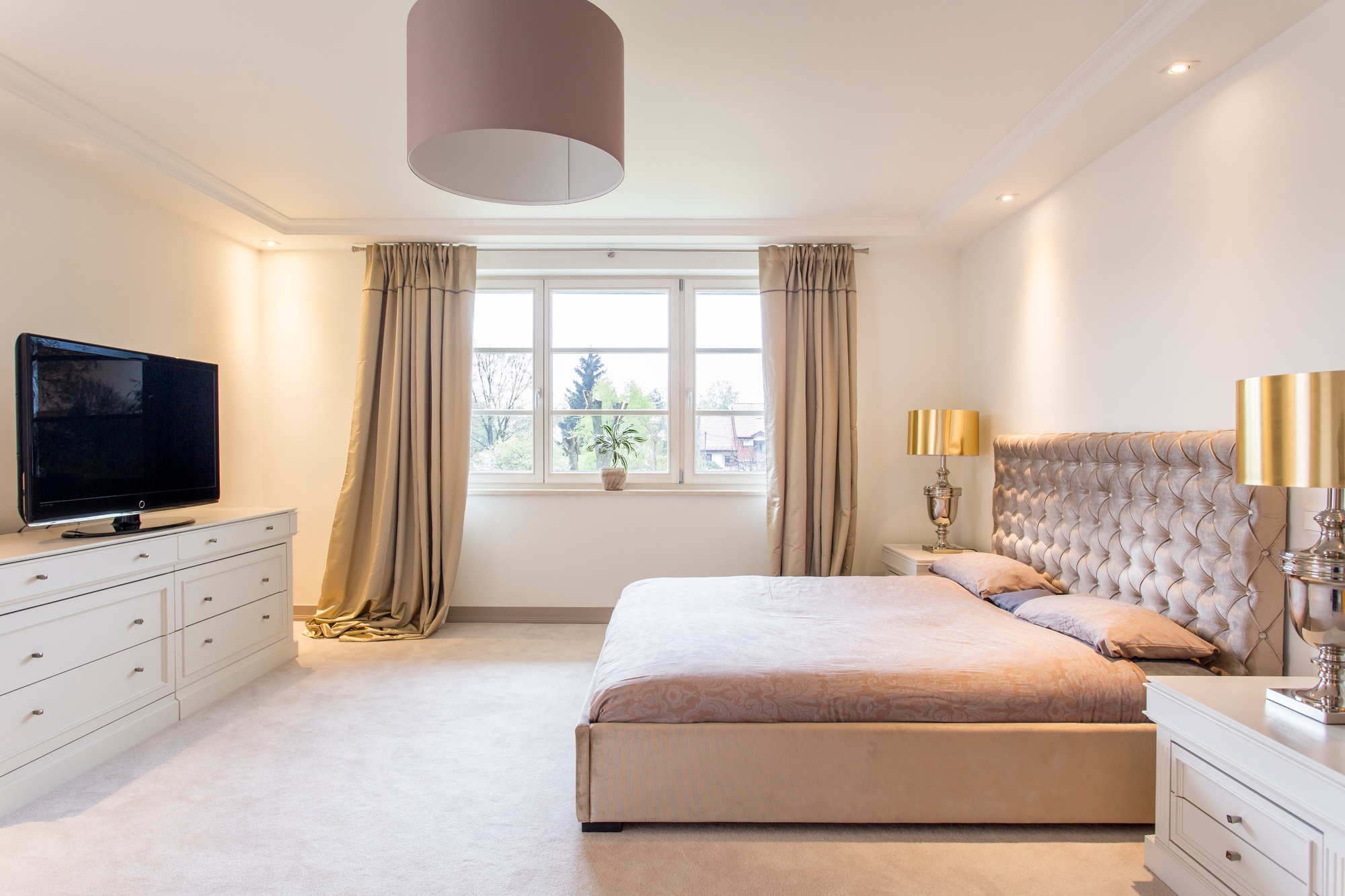 Spacious bedroom with a large bed